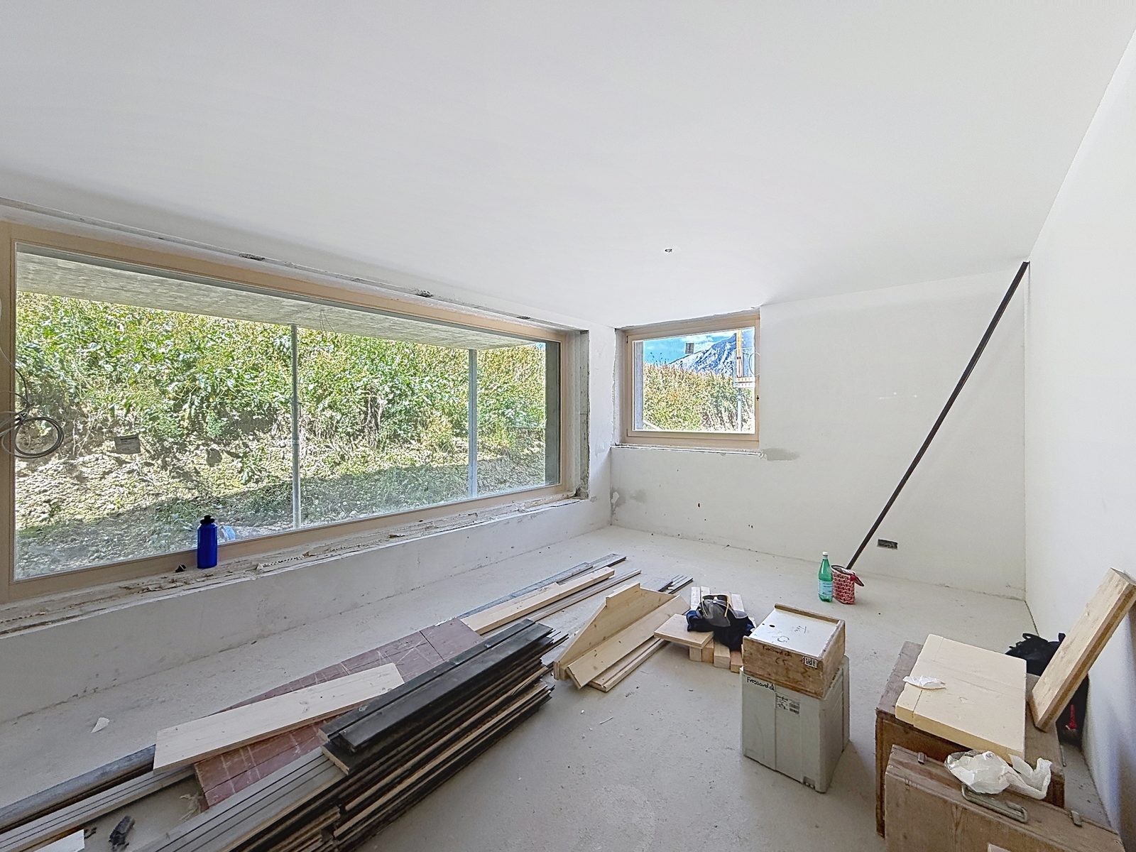 Séjour en construction avec grande baie vitrée